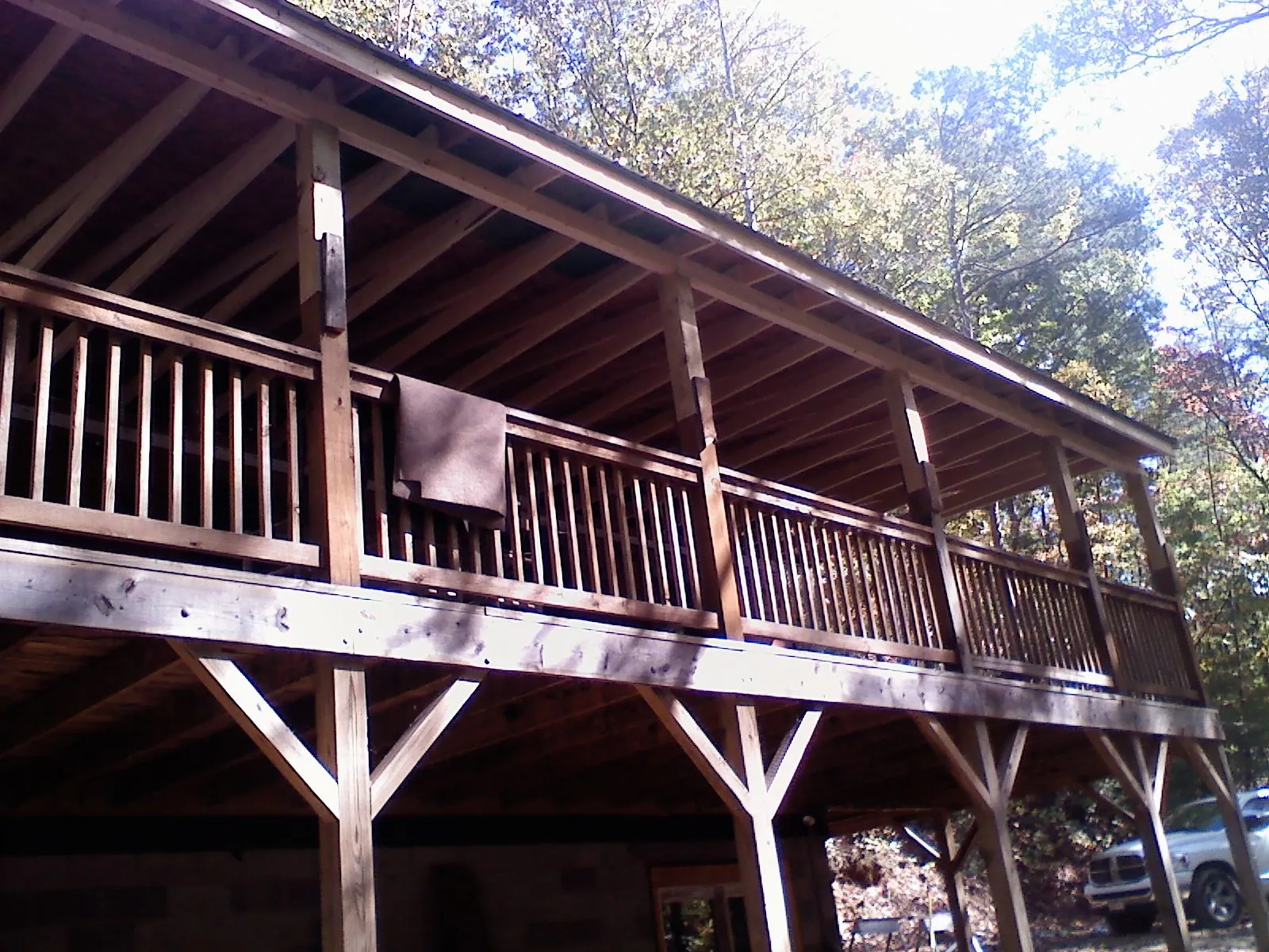 Timber framing under a new elevated porch and deck — Roof Leak Repair in Platte Center by Roofing Brothers